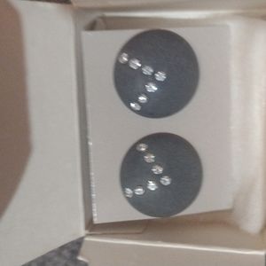 Vintage 1986 Very Rare earrings  nib with surgical steel post marked New York